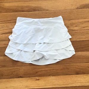White ruffled skirt